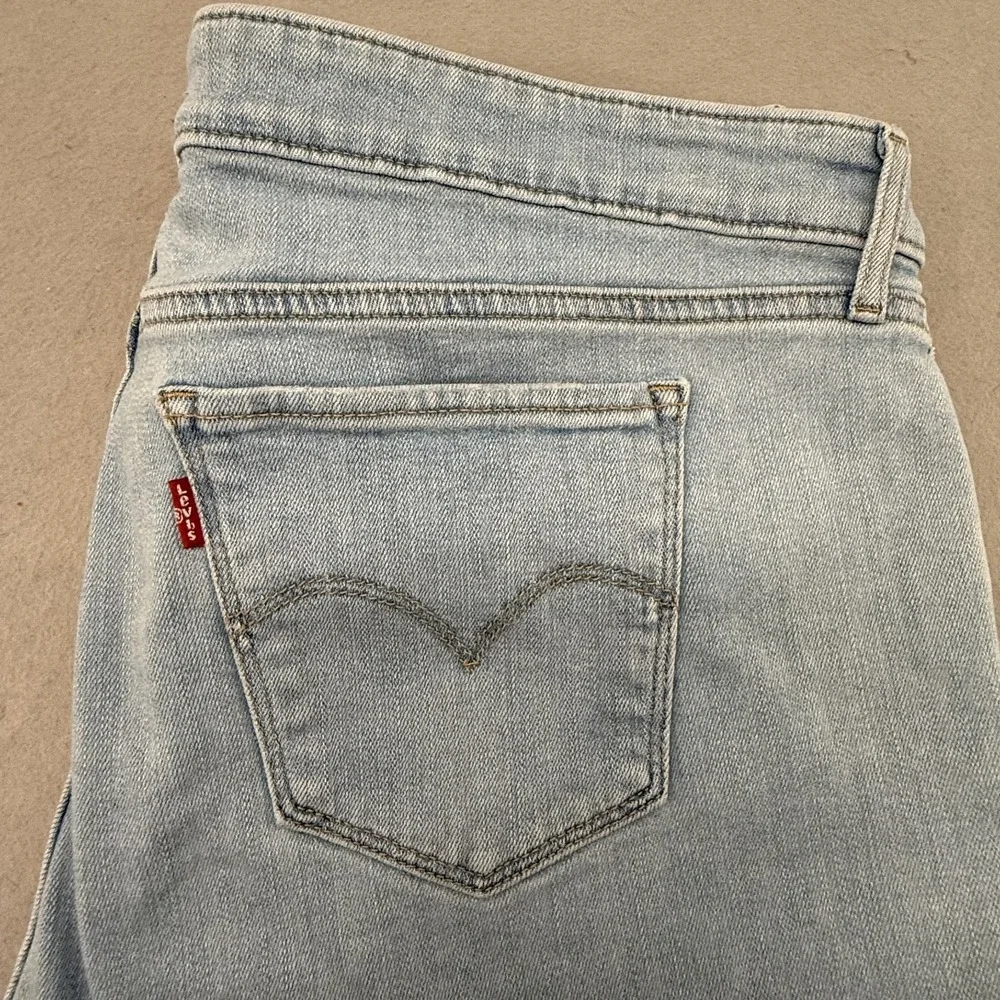 Levi's 513 Slim Straight Jeans Mens 34x30 Light‎ Wash Stretch Raw Hem Distressed